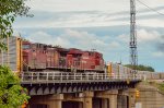 CP AC44CW + ES44AC Locomotives leading a train